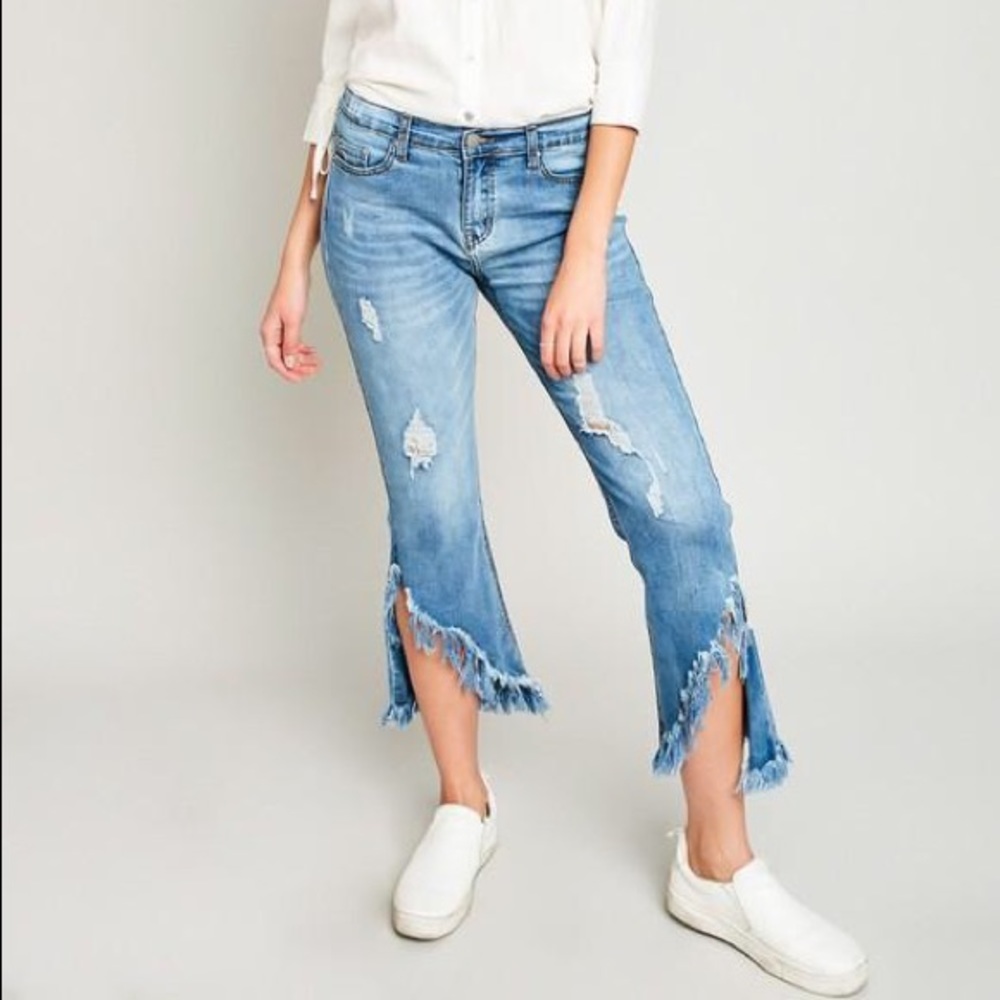 Distressed flared jeans